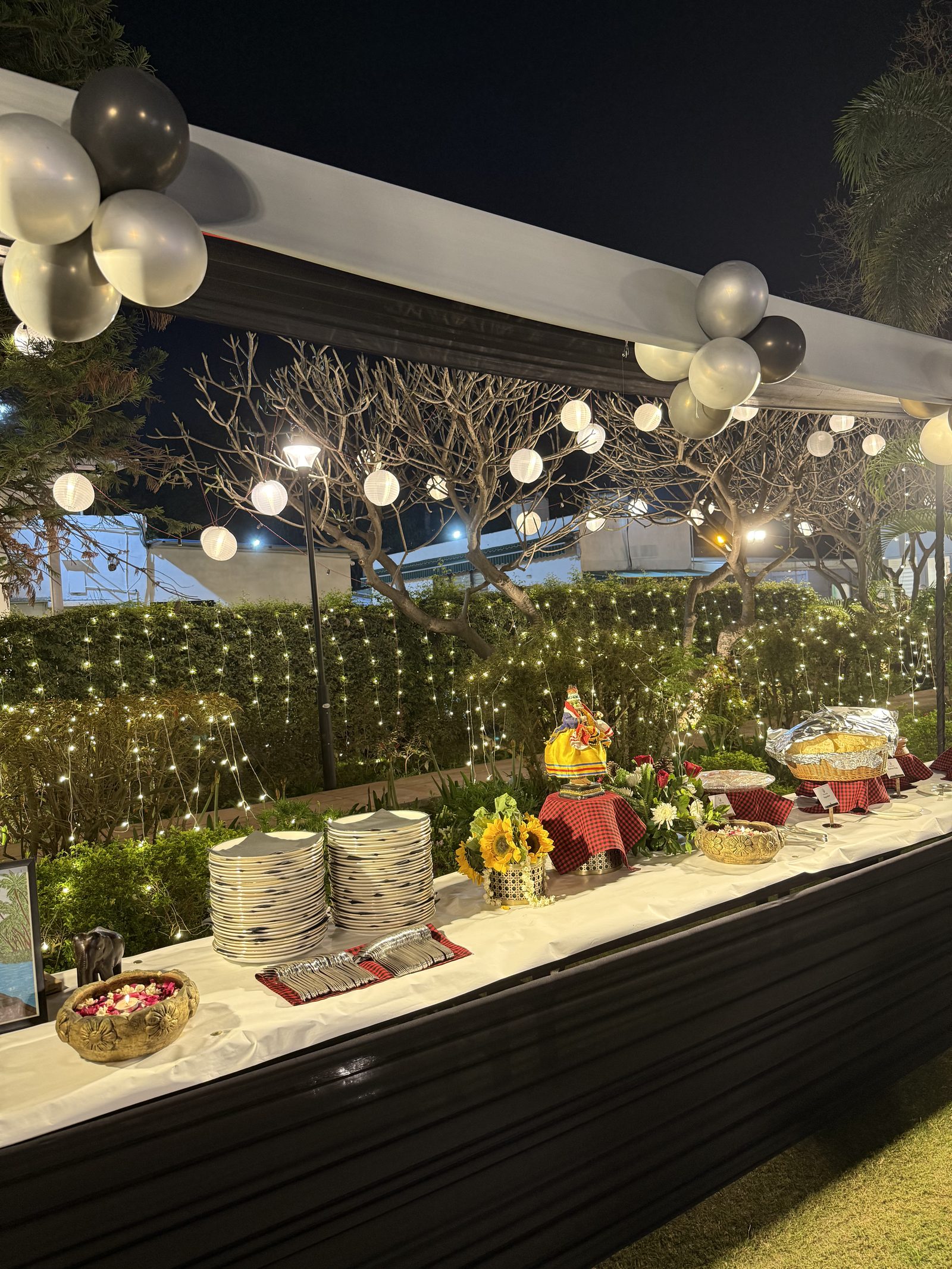 A Mahabelly catering spread under festive lights